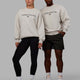 Duo wearing Unisex 1% Better Sweater Oversize - Lunar Rock-Pirate Black