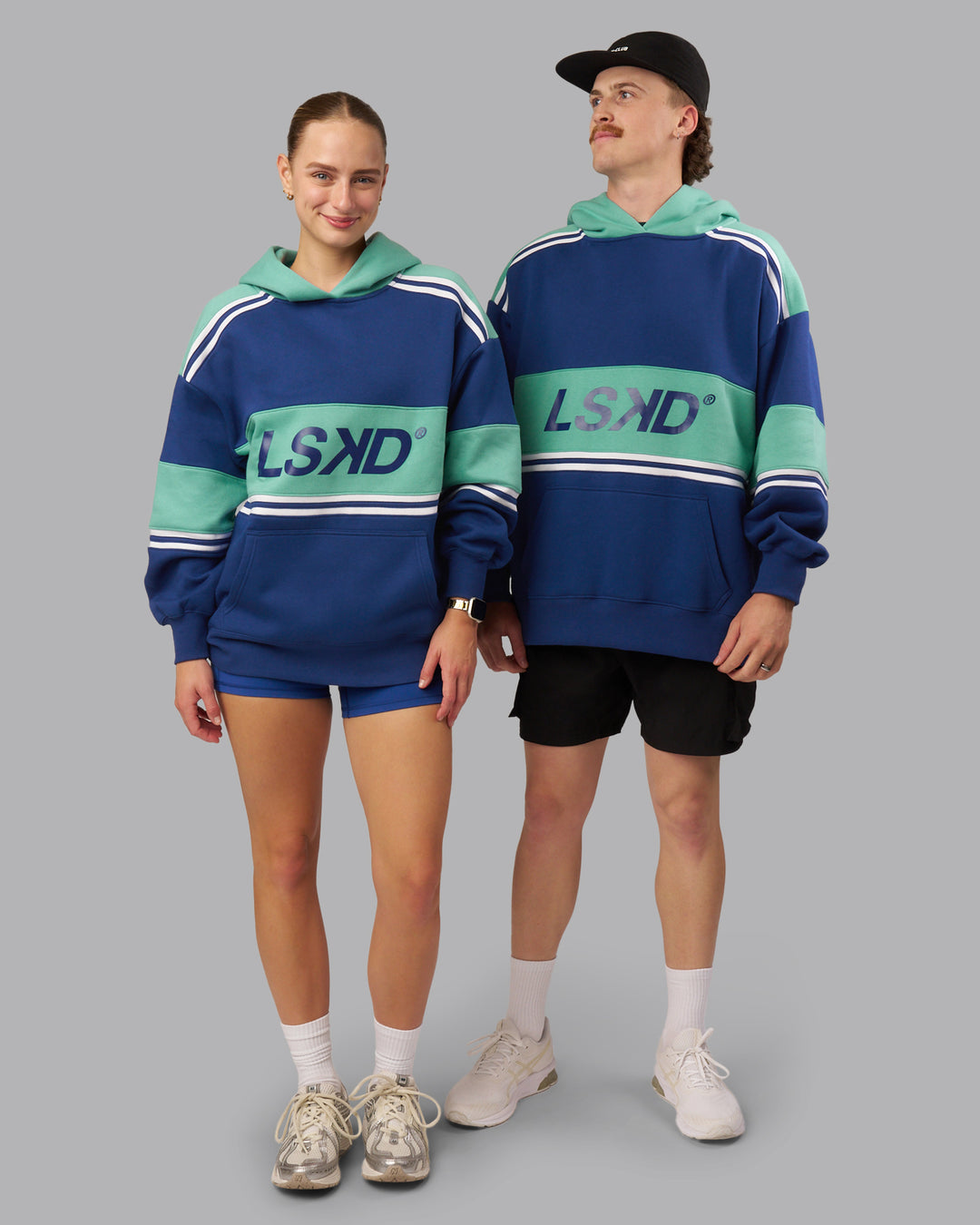 Duo wearing A-Team Oversized Hoodie - Midnight Blue-Agate Green | Model:Both | Size:Duo