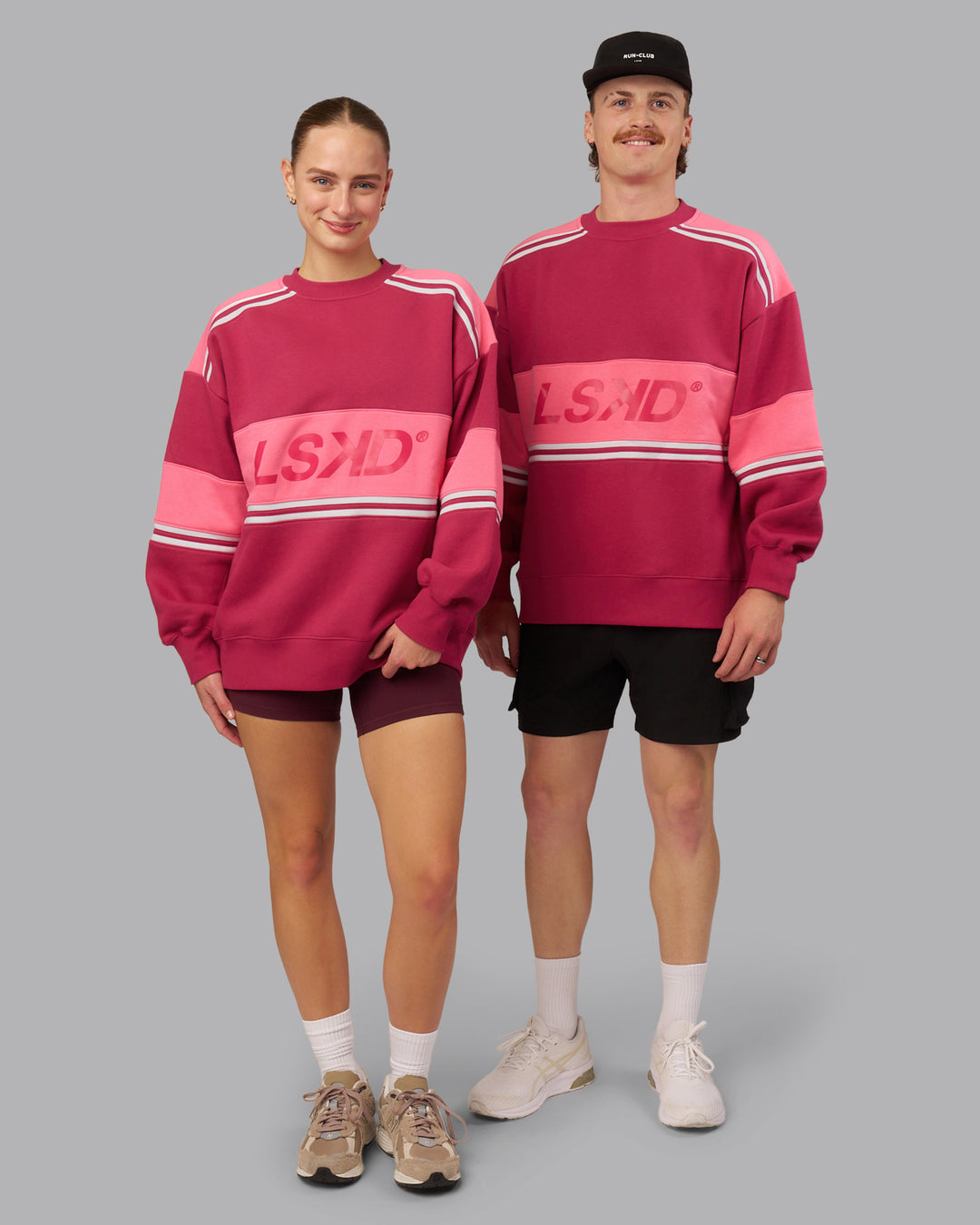 Duo wearing A-Team Sweater Oversize - Vivacious-Hot Pink | Model:Both | Size:Duo