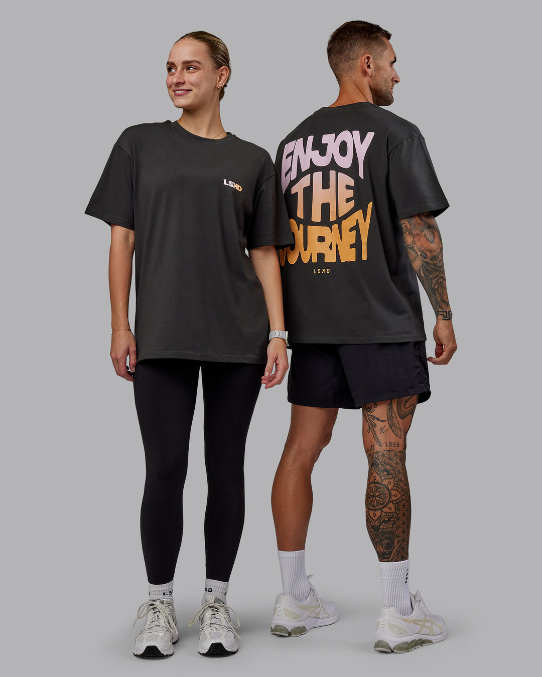 Duo wearing Unisex E.T.J FLXCotton Tee Oversize - Pirate Black-Pop Pink