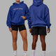 Duo wearing Unisex Enjoy the Journey Hoodie Oversize - Galactic Cobalt-Multi