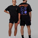 Duo wearing Unisex Good Times Global Heavyweight Tee Oversize - Black-Red-Purple