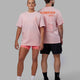 Duo wearing Unisex Good Times Global Heavyweight Tee Oversize - Marshmallow-Pink-Red