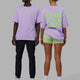 Duo wearing Unisex Good Times Heavyweight Tee Oversize - Pale Lilac-Paradise Green