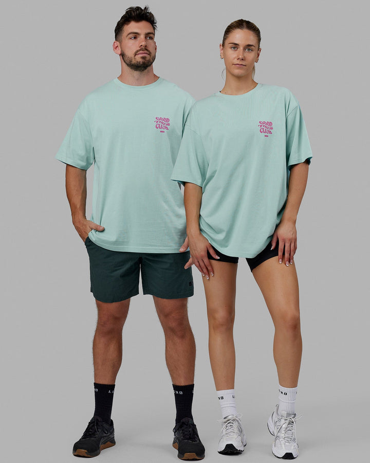 Duo wearing Unisex Good Times Heavyweight Tee Oversize - Pastel Turquoise-Spark Pink