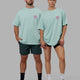 Duo wearing Unisex Good Times Heavyweight Tee Oversize - Pastel Turquoise-Spark Pink