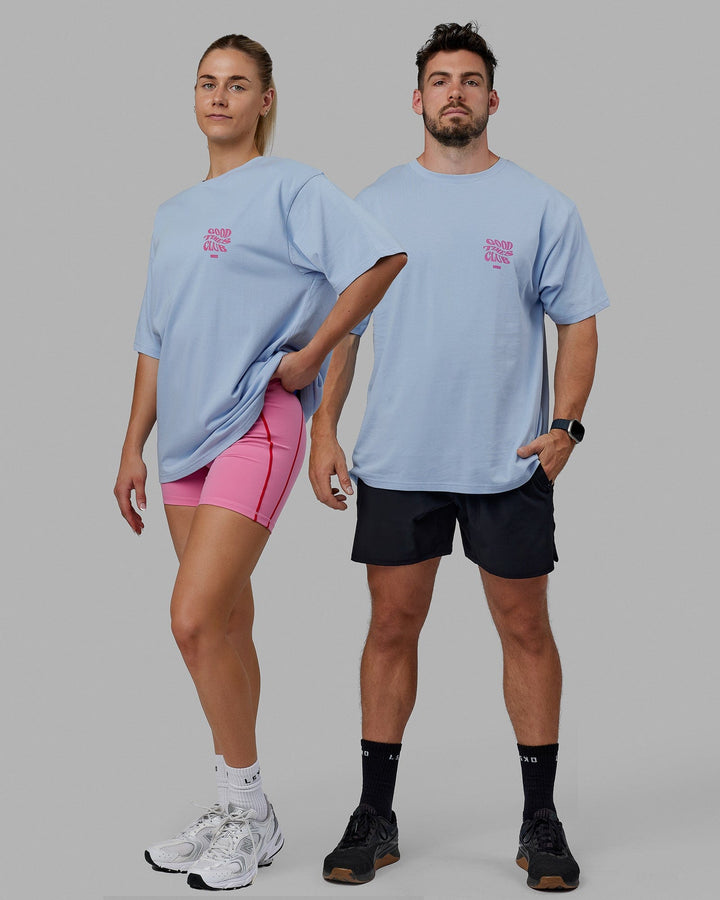 Duo wearing Unisex Good Times Heavyweight Tee Oversize - Windsurfer-Spark Pink