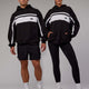 Duo wearing Unisex Intercept Hoodie Oversize - Black-White