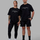 Duo wearing Unisex Just Keep Running FLXCotton Tee Oversize - Black-White