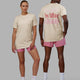 Duo wearing Unisex Lift-Up FLXCotton Tee Oversize - Warm White-BCAM