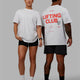 Duo wearing Unisex Lifting Club FLXCotton Tee Oversize - White-Red