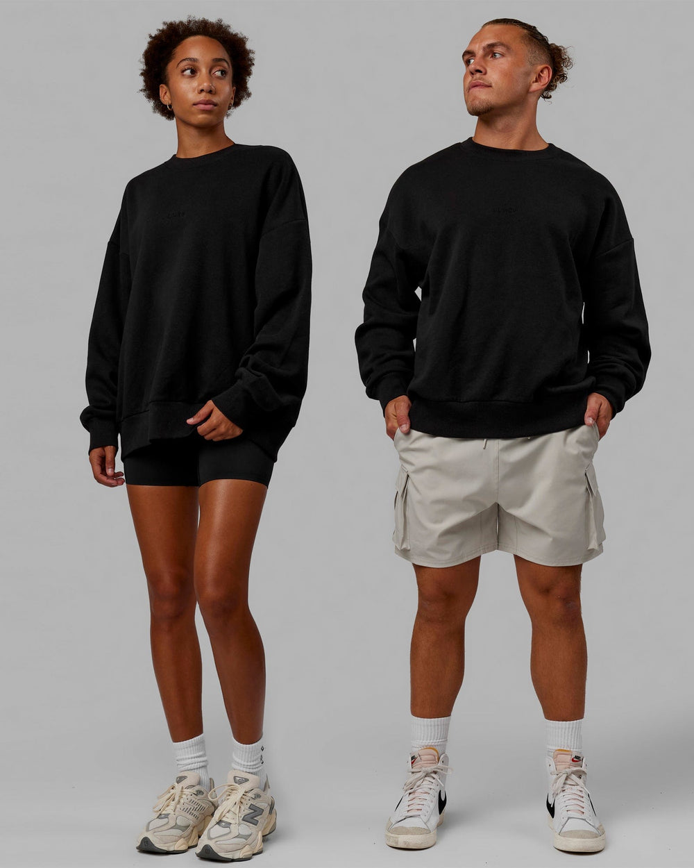Duo wearing Unisex MVP Sweater Oversize - Black