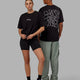 Duo wearing Unisex Mad Happy Heavyweight Tee Oversize - Black