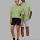 Duo wearing Unisex Mad Happy Heavyweight Tee Oversize - Green Fig