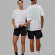 Duo wearing Unisex Mad Happy Heavyweight Tee Oversize - White