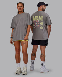 Duo wearing Unisex Miami25 Washed FLXCotton Tee Oversize - Storm Front-Lemon Fizz