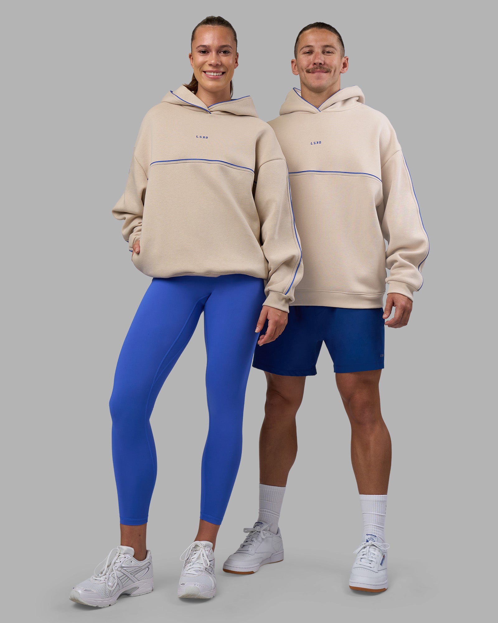 Duo wearing Unisex Oversized Piping Hoodie - Shale Beige-Power Cobalt | Model:Duo | Size:Duo