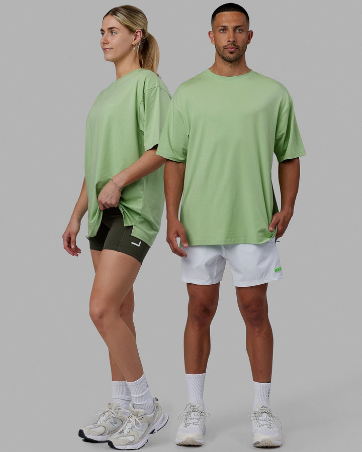 Duo wearing Unisex PimaFLX Tee Oversize - Green Fig