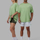 Duo wearing Unisex PimaFLX Tee Oversize - Green Fig