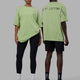 Duo wearing Unisex Rise & Lift Heavyweight Tee Oversize - Washed Green Fig