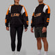 Duo wearing Unisex Slam Sweater Oversize - Black-Ultra Orange