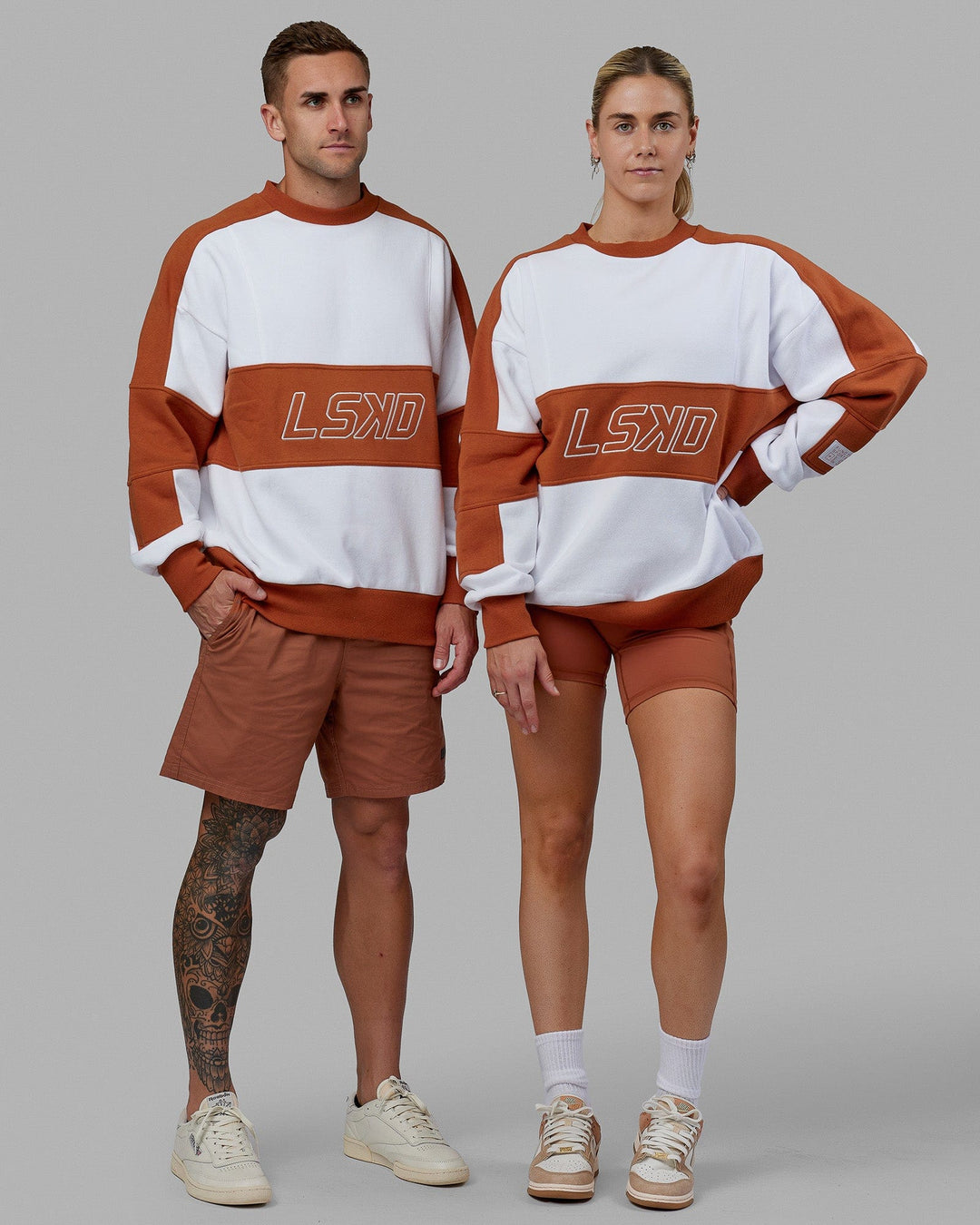 Duo wearing Unisex Slam Sweater Oversize - White-Orange