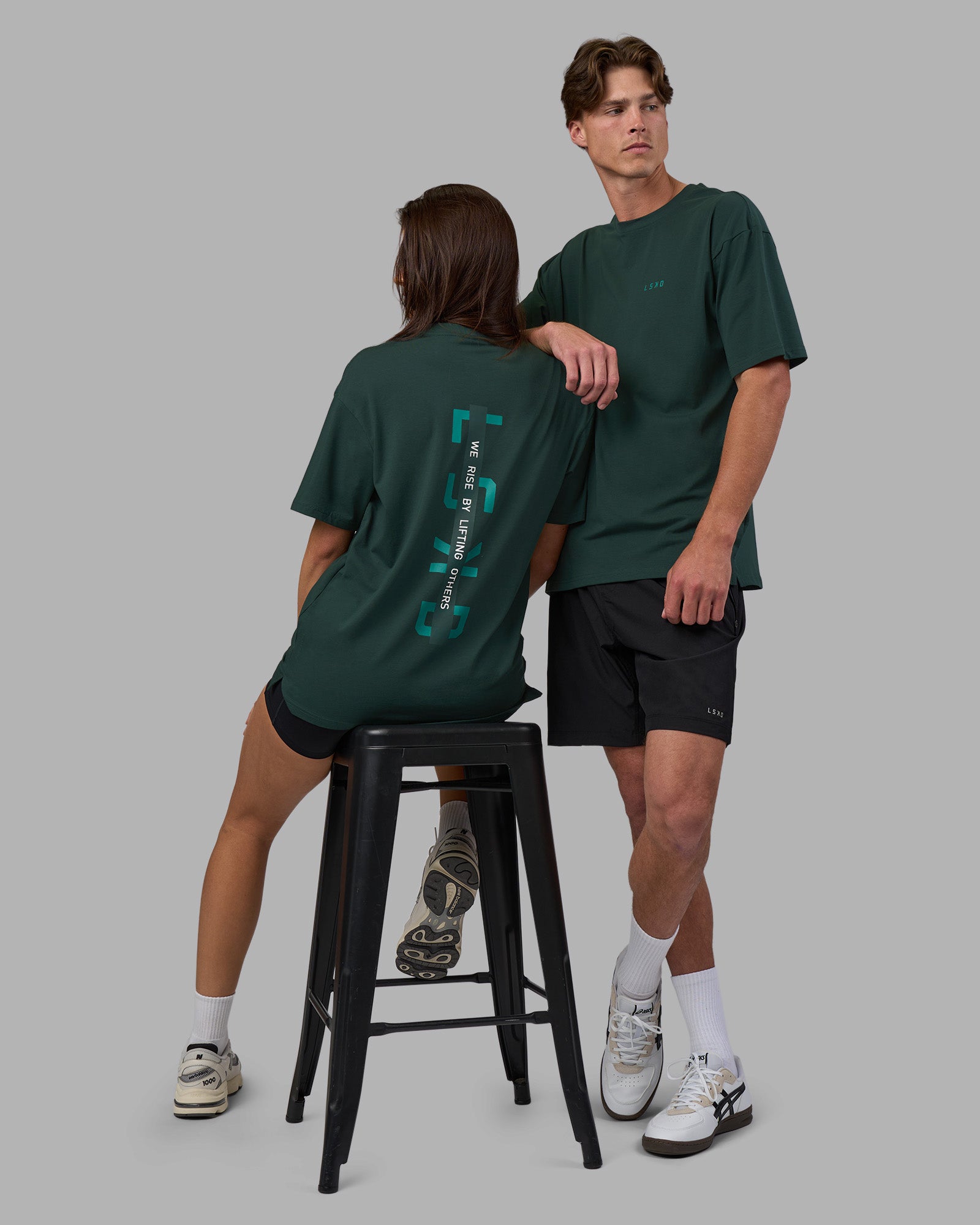 Duo wearing Unisex Strike Through FLXCotton Tee Oversize - Vital Green-Alexandrite | Model:Both | Size:Duo