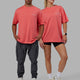 Duo wearing Unisex Taylor Tee Oversize - Coral