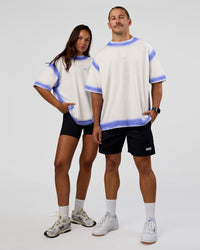 Duo wearing Urban Blur Heavyweight Unisex Oversized Tee - Off White-Power Cobalt | Model:Both | Size:Duo