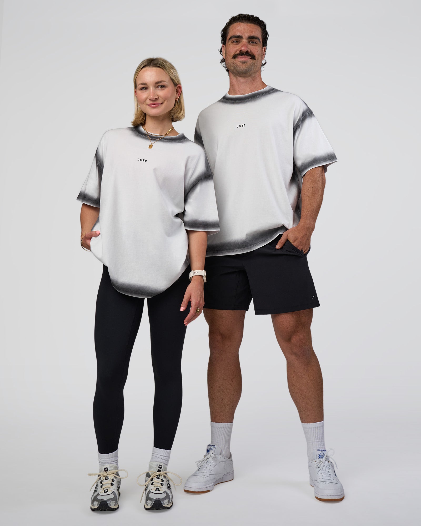 Duo wearing Urban Blur Heavyweight Unisex Oversized Tee - White-Black | Model:Both | Size:Duo