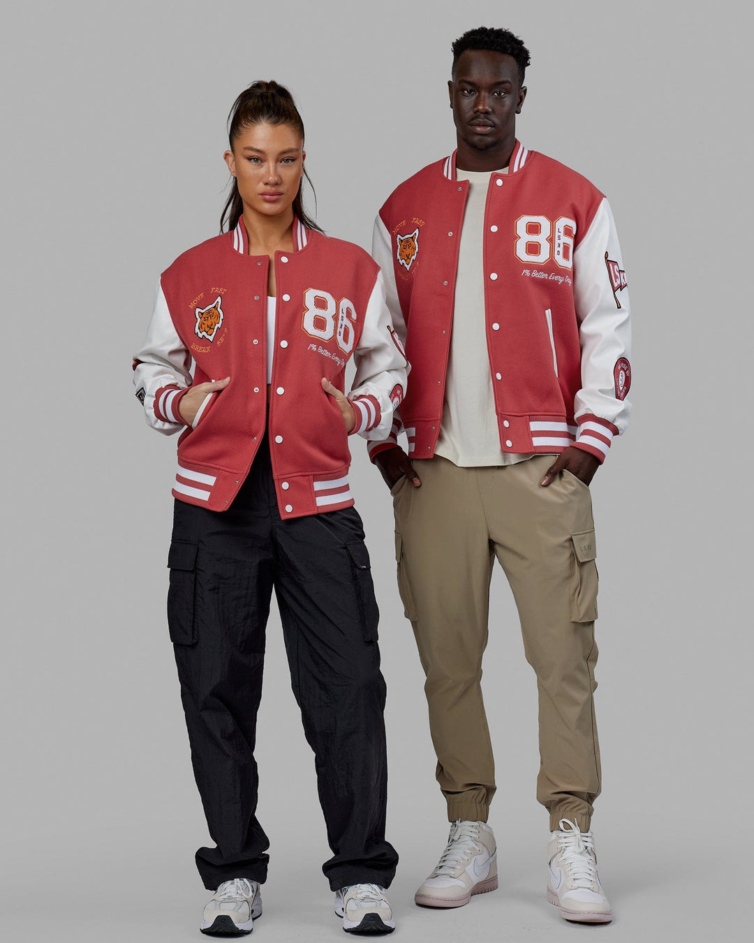 Duo wearing Unisex Varsity Bomber Jacket - Mineral Red
