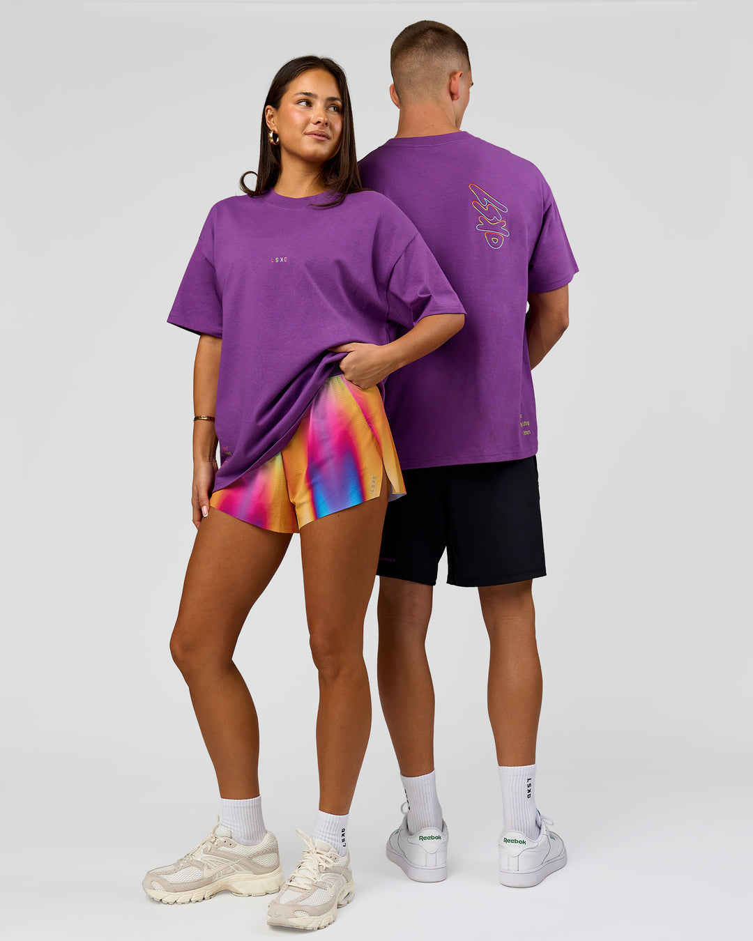 Duo wearing Pride Sticker Boxy Tee - Fresh Purple | Model:Bianca | Size:XS | Model:Albert | Size:M