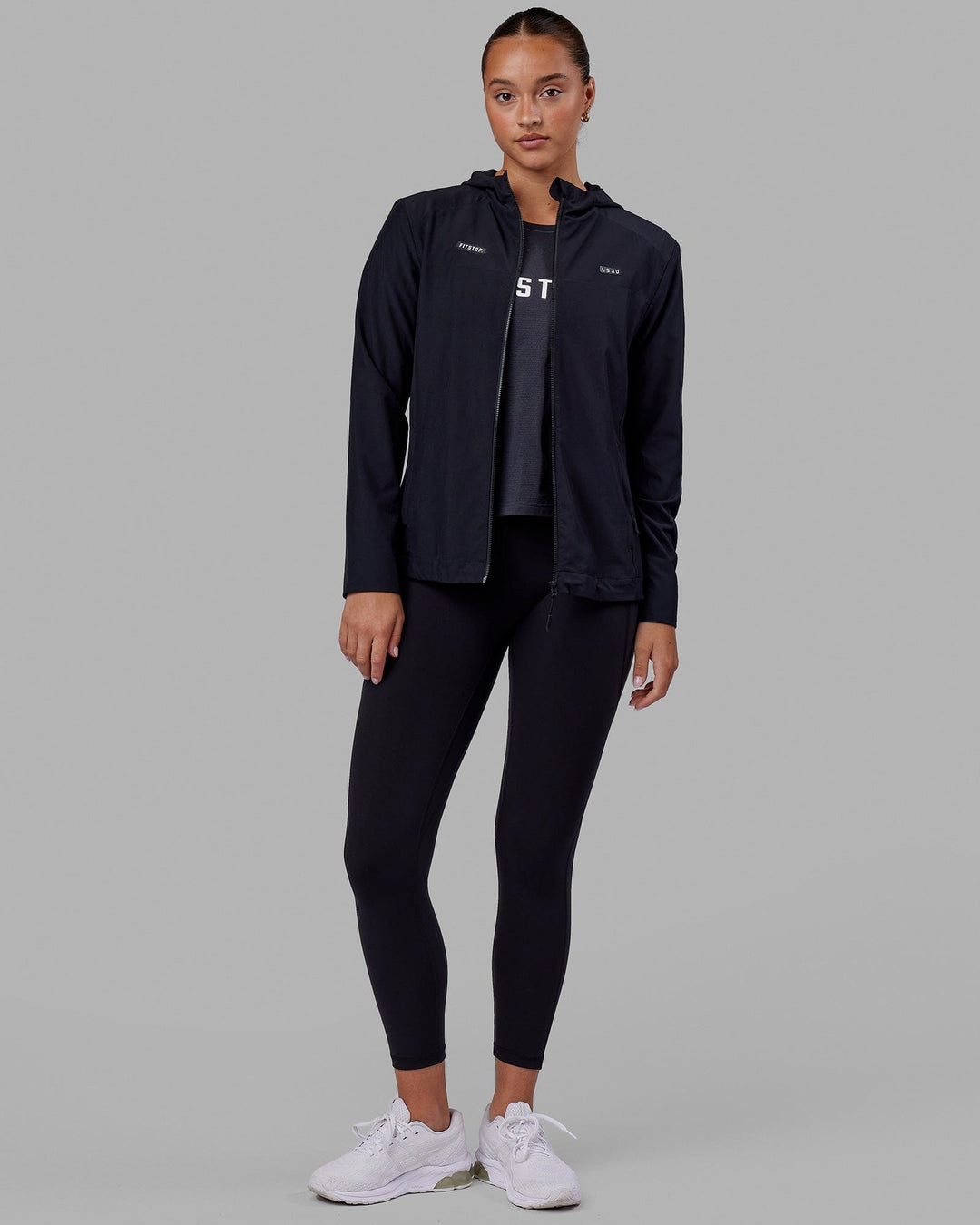 Woman wearing Fitstop Womens Functional Training Jacket - Black