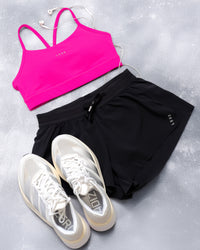 Woman wearing Lift Sports Bra - Ultra Pink