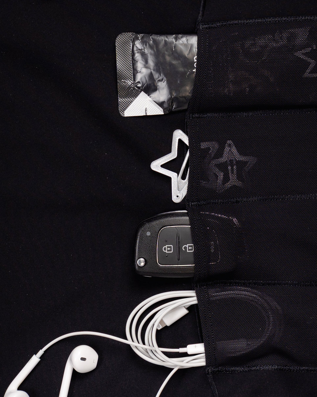 Close up of NyxRun Stash Tank - Black