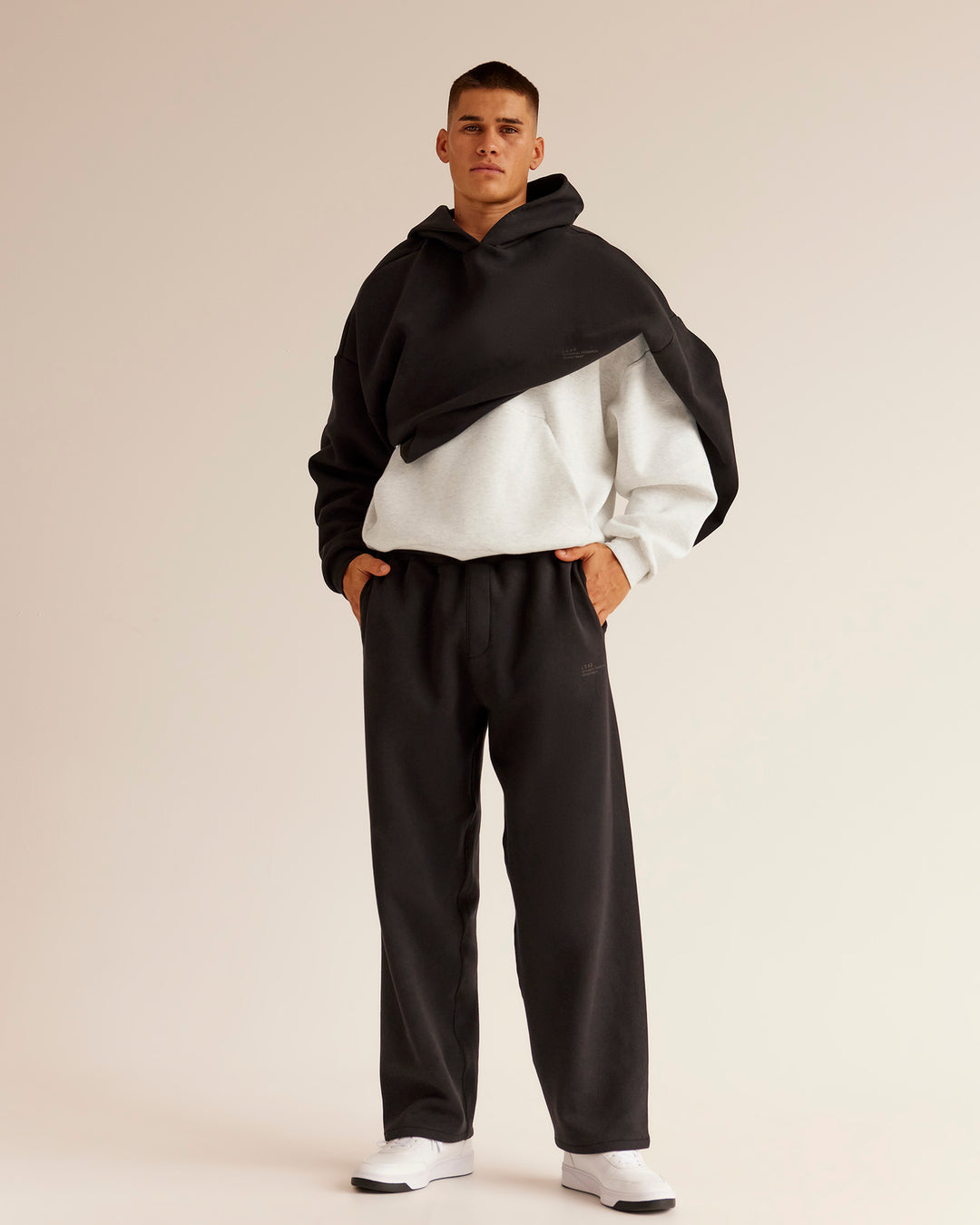 Man wearing AfterDark ZeroCrease Straight Leg Pant - Black | Model:Jackson | Size:L