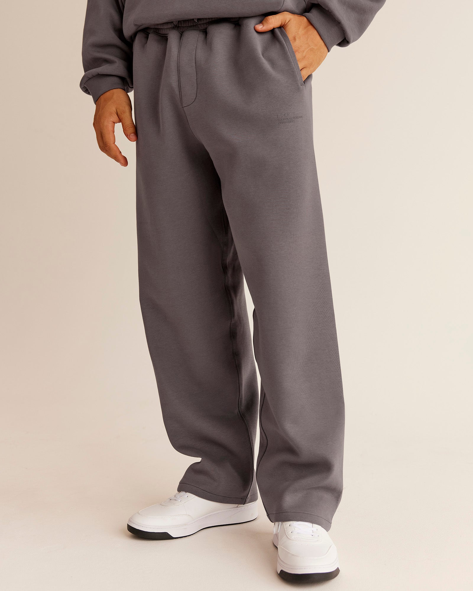 Man wearing AfterDark ZeroCrease Straight Leg Pant - Duskstone | Model:Jackson | Size:L