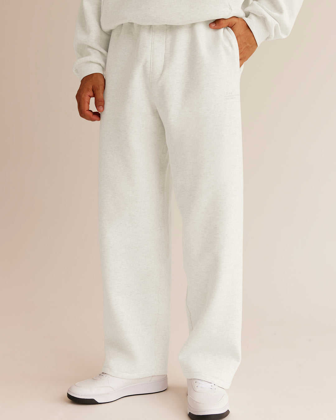 Man wearing AfterDark ZeroCrease Straight Leg Pant - Silver Marl | Model:Jackson | Size:L