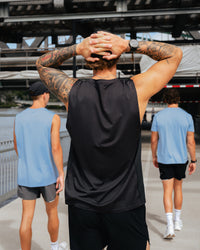 Man wearing AirTrack Muscle Tank - Black | Model:Zane | Size:L