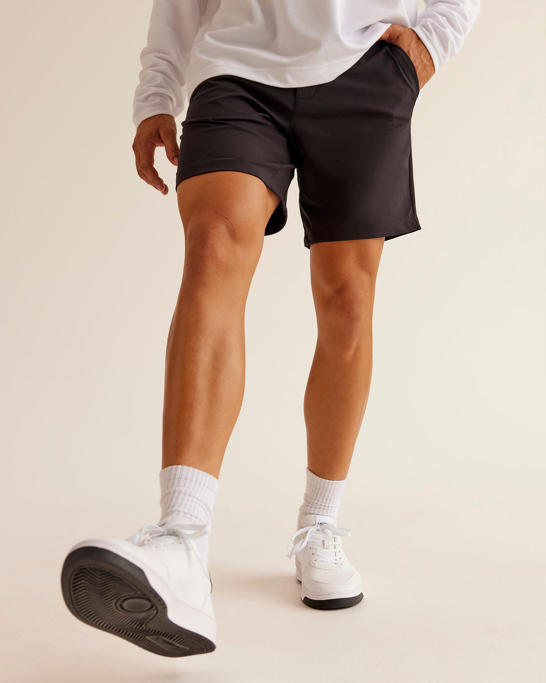 Man wearing All Day ZeroCrease™ Regular 8" Short - Black | Model:Jackson | Size:34