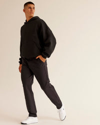 Man wearing All Day ZeroCrease™  Regular Pant - Black | Model:Jackson | Size:34