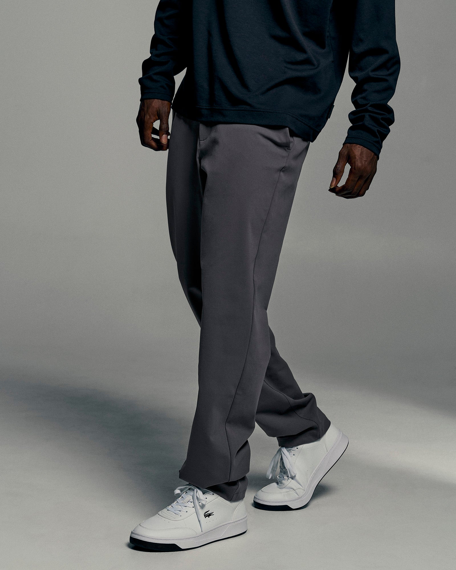 Man wearing All Day ZeroCrease™  Regular Pant - Dark Storm | Model:Okello | Size:L