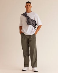 Man wearing All Day ZeroCrease™ Wide Leg Pant - Walnut Grey | Model:Jackson | Size:L