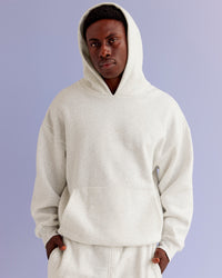 Man wearing Base Oversized Hoodie - Silver Marl | Model:Paabio | Size:L