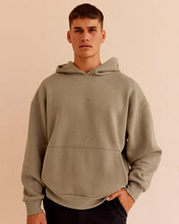 Man wearing Base Oversized Hoodie - Taupe Ash | Model:Jackson | Size:L
