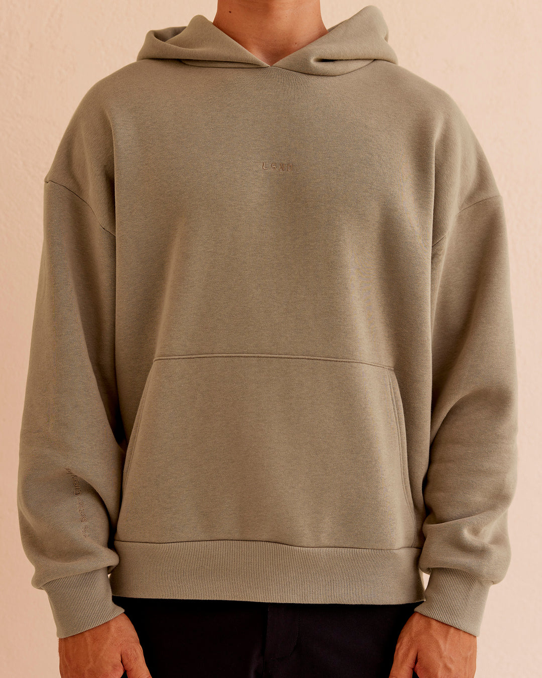 Man wearing Base Oversized Hoodie - Taupe Ash | Model:Jackson | Size:L