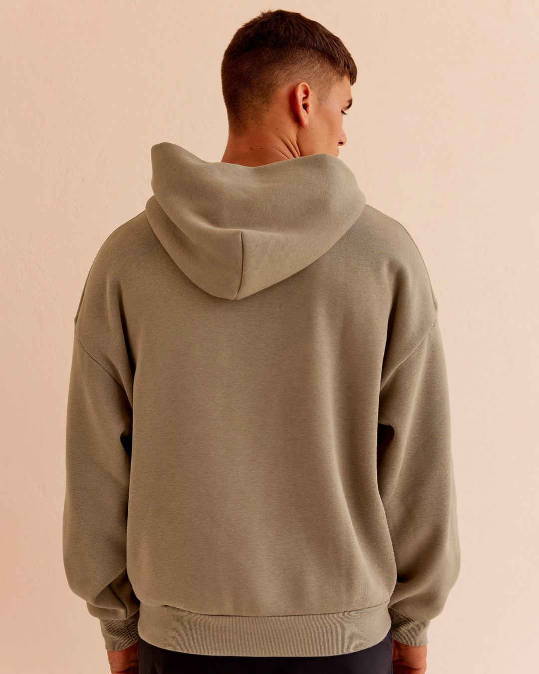 Man wearing Base Oversized Hoodie - Taupe Ash | Model:Jackson | Size:L