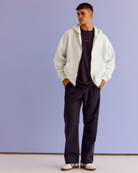 Man wearing Base Zip Through Oversized Hoodie - Silver Marl | Model:Jackson | Size:L