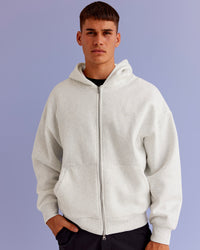 Man wearing Base Zip Through Oversized Hoodie - Silver Marl | Model:Jackson | Size:L