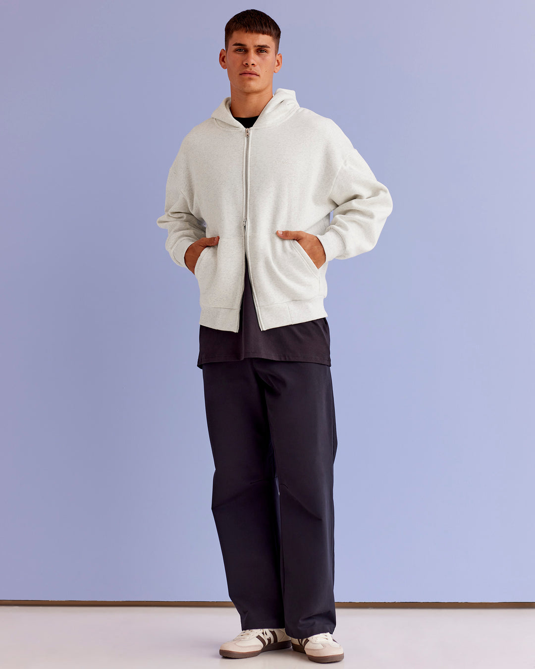 Man wearing Base Zip Through Oversized Hoodie - Silver Marl | Model:Jackson | Size:L